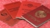 GENERIC – Old Soviet documents on a red background 