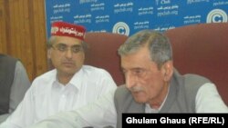 FILE: The explosion took place as Haroon Bilour (L), the party's candidate for a provincial assembly, was arriving for a party meeting.