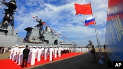 China's navy holds a welcome ceremony as a Russian naval ship arrives in Zhanjiang, southern China, in 2016. 