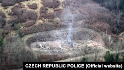 Depozite private de muniție avariate de explozii în apropiere de Vrbětice, Republica Cehă, 20 octombrie 2014.