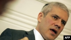Serbian President Tadic vowed anew that "Serbia will never take a single action that implies Kosovo's independence."