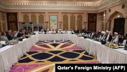 قطر کې د افغانستان سولې لپاره د امریکا ځانګړي استازي زلمي خلیلزاد او طالبانو پلاوي ترمنځ مذاکرات. ۲۰۱۹، ۲۶ فبروري
