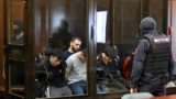 A group of defendants accused of involvement in the 2024 Crocus City Hall music venue gun attack that killed 149 people, goes on trial in Moscow on August 4, 2025. (Photo by Alexander NEMENOV / AFP)