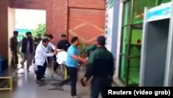 Pakistan's Interior Minister Ahsan Iqbal was rushed to hospital after being shot in the eastern district of Narowal on May 6. 
