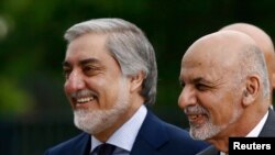 FILE: Ashraf Ghani (R) partnered with Chief Executive Abdullah Abdullah in the National Unity Government.