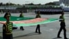 Turkmen servicemen march during a military parade marking the 25th anniversary of Turkmenistan's independence, in Ashgabat on October 27.