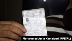 Most Afghans now carry a handwritten ID card called Tazkara