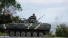 Украински военнослужещи на бронетранспортьор (БТР), 7 септември 2022 г. 