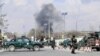 Security forces guard the area as smoke billows from the Sardar Daud Khan's Hospital, also known as Kabul Military Hospital, during an attack by suspected militants in Kabul on March 8.