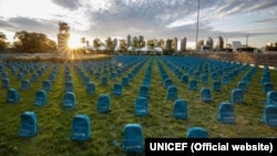UNICEF laid kids' backpacks on the lawn near its building in New York in neat rows reminiscent of a graveyard as a public reminder of how many children die in "violent conflicts" each year. 