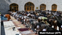 Worshippers offer Friday prayers on the first day of the Muslim holy month of Ramadan at Pul-e Khishti mosque in Kabul on April 24.