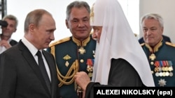 Владимир Путин, Сергей Шойгу, Патриарх Кирилл