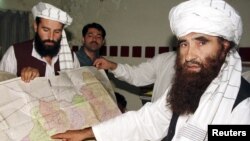 FILE: The Haqqani network is named after Jalaluddin Haqqani (R).