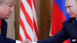 Trump și Putin într-o imagine de arhivă, de la summitul lor din Finlanda (2018) 