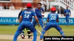 FILE: The Afghan national team in a match in London in July.