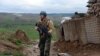 An soldier keeps watch during an operation in Bala Morghab district of the northwestern Badghis Province on March 26.