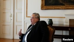 шефот на грчката дипломатија Никос Коѕијас
