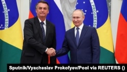 Експрезидент Бразилії Жаїр Болсонару (л) із російським колегою Володимиром Путіним, архівне фото