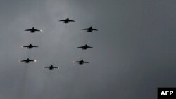 Both Russia and the U.S.-led coalition have hit IS targets in Syria, though Washington has accused Moscow of using its operation primarily to prop up Assad.