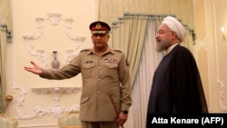 Iranian President President Hassan Rouhani (R) met Pakistani Army Chief General Qamar Javed Bajwa in Tehran on November 6.