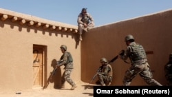 FILE: Afghan National Army (ANA) soldiers during a training in Helmand province.