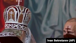 Vladimir Putin și Patriarhul Kirill al Moscovei.