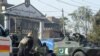 Pakistani soldiers outside an Agriculture Training Institute after an attack by Taliban militants in Peshawar on December 1.