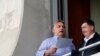 Orbán Viktor miniszterelnök Mészáros Lőrinccel beszélget a felcsúti stadionban 2019-ben