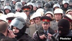Armenia -- Riot police confront opposition protesters in Yerevan on March 1, 2008.